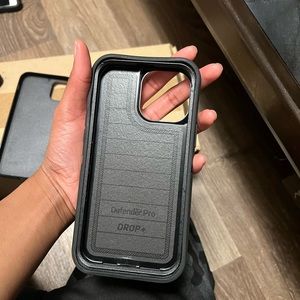 All black otter box for the iPhone 13 Pro Max
